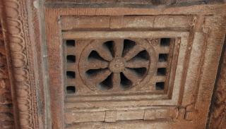 Dharma wheel window in the Mahakuta group of temples