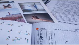 The image is of several bullet journals, with text, photographs and various yoga poses, provided by a participant to show how they practice self-care.