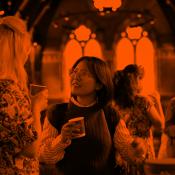 Group of people talking at a networking event