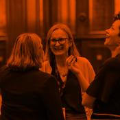 Group of people talking at a networking event