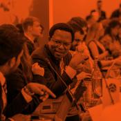 Group of people talking at a networking event