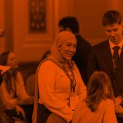 Group of people talking at a networking event