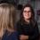 Two females engaged in conversation