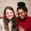 Two women at a drinks reception smiling for a photo