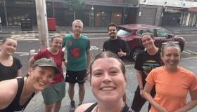 Eve Harrison-Taylor taking a selfie with the 7 BISA delegates that attended the 5km fun run