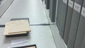 archival materials on the floor