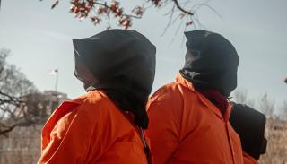 Demonstrators outside the White House on January 11, 2022, commemorating the 20th anniversary of the Guantanamo Bay Detention Center