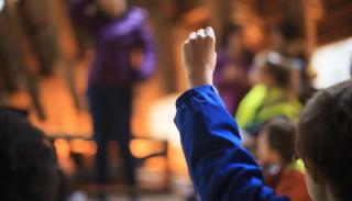 Raised hand at meeting