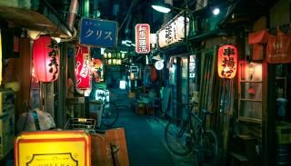 Japanese street lined with pubs and restaurants