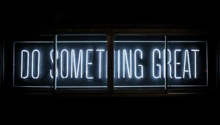 Neon sign saying 'Do something great'