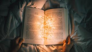 A story book with fairy lights
