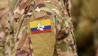 Soldier with FARC badge on jacket