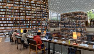 People studying inside Korea City Air Tower, Seoul