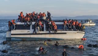 Syrians and Iraq refugees arrive at Skala Sykamias Lesvos Greece