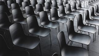 Black chairs ready for a conference