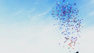 Photo of person pulling a party popper