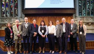 A group photo of the participants in the BISA 50th anniversary former Chair roundtable in Belfast. Left to Right is Juliet Dryden, Barry Buzan, Kyle Grayson, Mark Webber, Caroline Kennedy Pipe, Ruth Blakeley, Richard Whitman, Chris Hill and Chris Brown