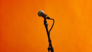 microphone on an orange background