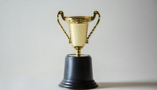 Gold trophy on a white background
