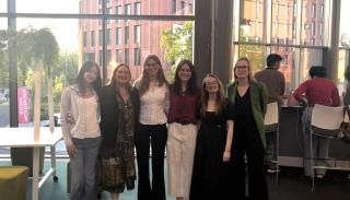 A group shot of several members of the UGN committee with Juliet Dryden, Evie Aspinall and Juanita Elias at Warwick University