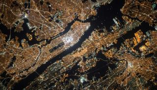 aerial shot of a lit up area of the globe 