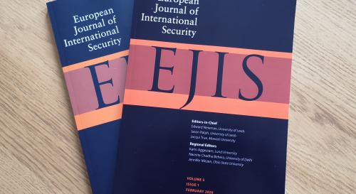 EJIS journals on a coffee table