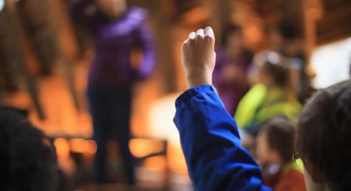 Raised hand at meeting