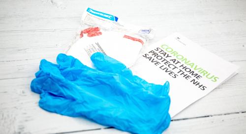 NHS leaflet and surgical gloves