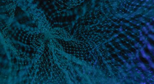 An abstract shot of a blue mesh against a dark background, representing a digital network