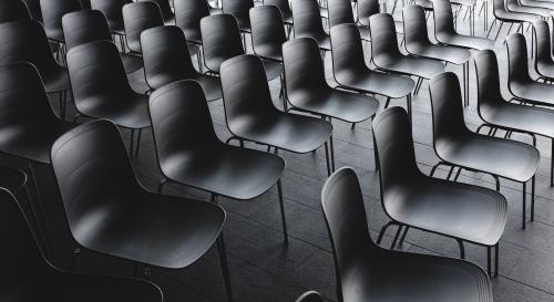 Black chairs ready for a conference