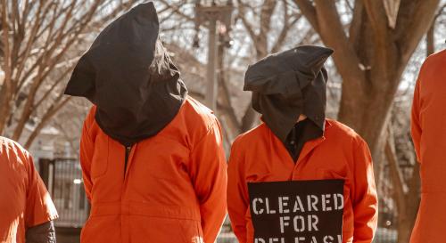 Protesters outside the White House on the 20th anniversary of Guantanamo Bay