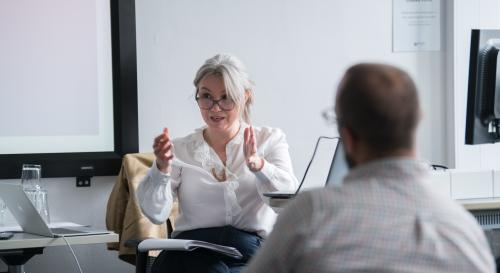 Clare Lynch delivering a writing workshop in 2022