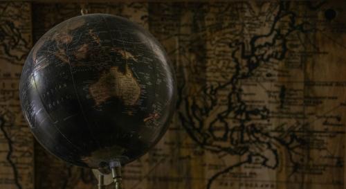 A globe against a map 